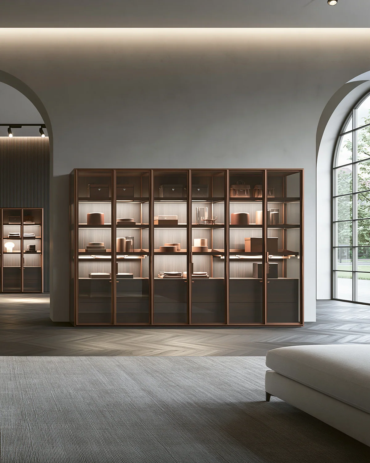 A bronze aluminum residential display vitrine, shown as an associated cabinet detail
