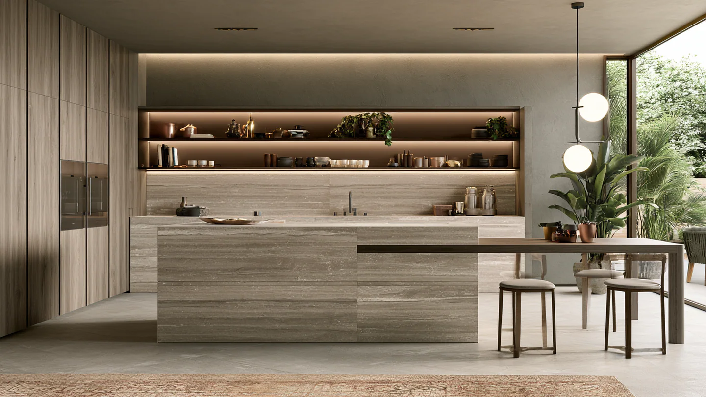 A linear travertine-look sintered stone kitchen, shown as a wide room view